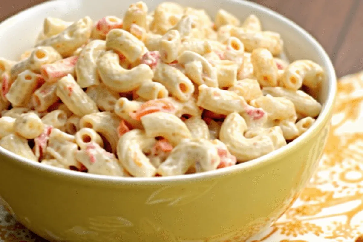 Creamy Hawaiian Macaroni Salad recipe in a yellow bowl.